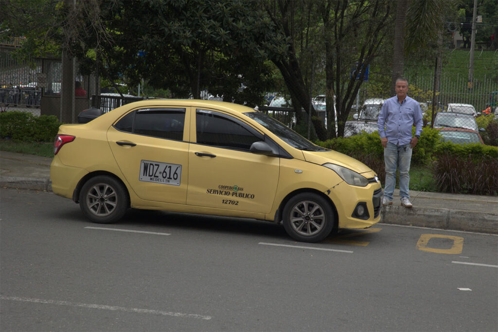 Imagen de Taxi y Juan Guillermo