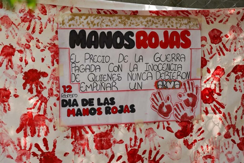 Imagen DÍA MANOS ROJAS 3